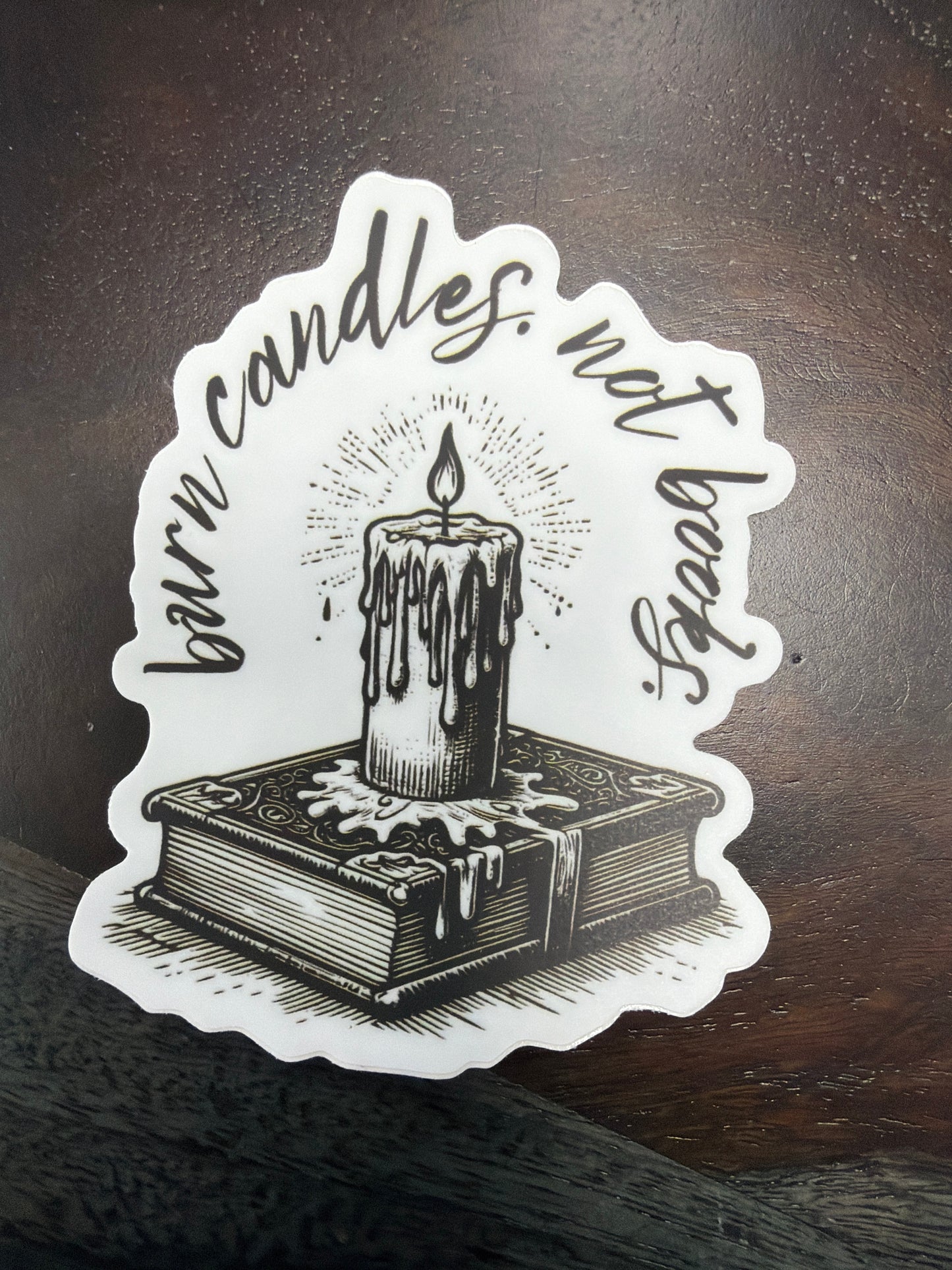 Sticker: Burn Candles Not Books